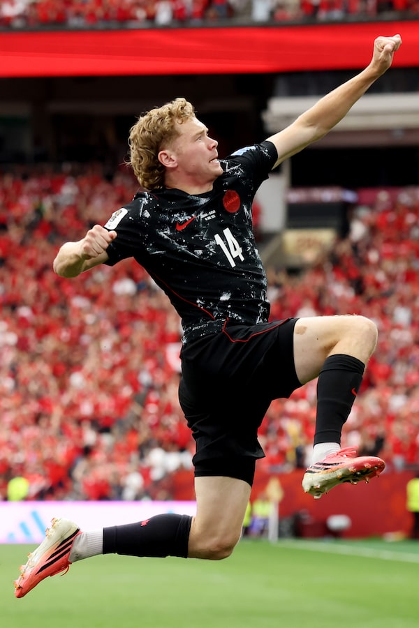 Jacob Shaffelburg celebrates after scoring the fifth of six goals Canada scored against Qatar on Thursday at BC Place.