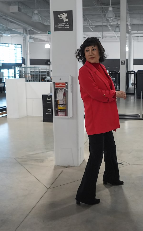 Ruby Liu tours a former Hudson's Bay-owned Saks Off 5th department store after a 'handover ceremony' where she received the keys to the space she owns at Tsawwassen Mills shopping mall in Tsawwassen, B.C., in June.