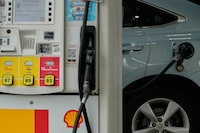 A motorist fills up the gas tank at a Shell gas station in Lincolnshire, Ill., Wednesday, April 15, 2026. (AP Photo/Nam Y. Huh)