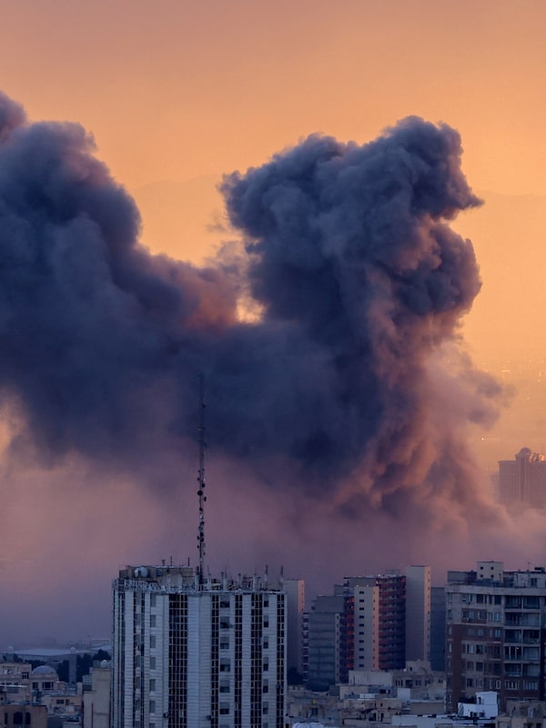 A plume of smoke rises after a strike on the Iranian capital Tehran, on March 3, 2026. The United States and Israel launched strikes against Iran on Feb. 28.