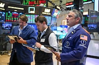 Traders work on the floor of the New York Stock Exchange (NYSE) during morning trading on August 24, 2026 in New York City. Oil prices eased after strong gains last week while stock markets faltered on Monday as investors awaited details of a US plan to impose massive economic pressure on Iran to end the Middle East war. (Photo by ANGELA WEISS / AFP via Getty Images)