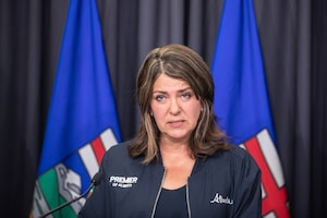 Alberta Premier Danielle Smith speaks at a press conference in Edmonton, Thursday, July 25, 2024. Smith says she plans to add the right to decide whether to receive a vaccination or other medical procedure to the Alberta Bill of Rights. THE CANADIAN PRESS/Jason Franson