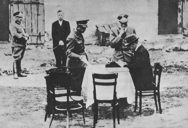 German-occupied city Bydgoszcz in Poland. Open air session of the Nazi-German “Special court in Bydgoszcz” (de: Sondergericht Bromberg). Polish defendant is visible in the background (second from the left). The person sitting at the table (in hat) is Richard Michalowsky who issued 183 death penalty sentences in Bydgoszcz between September 1939 and January 1945.
Captions are provided by our contributors.