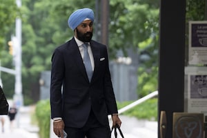 Former Liberal MP Raj Grewal makes his way to court, Monday, July 18, 2022 in Ottawa. Grewal is in an Ottawa courtroom today to seek the dismissal of two criminal charges connected to his time in office. THE CANADIAN PRESS/Adrian Wyld