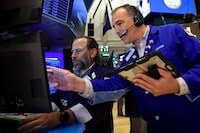 Traders work on the floor at the New York Stock Exchange (NYSE) in New York City, U.S., June 24, 2026.  REUTERS/Brendan McDermid