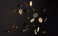Falling Canadian dollar coins or loonies are pictured in North Vancouver, B.C. Wednesday, May 29, 2019. THE CANADIAN PRESS/Jonathan Hayward
