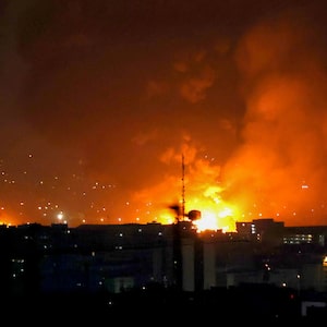 Smoke and fire rise from the site of airstrikes at Mehrabad International Airport in Tehran on March 7, 2026. Israel said on March 7 it had launched "broad-scale" strikes on targets in Tehran, as the Iranian state broadcaster reported an explosion in the western part of the city. (Photo by ATTA KENARE / AFP via Getty Images)