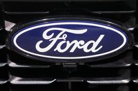 FILE PHOTO: The logo of Ford is seen on a car in Brussels, Belgium January 16, 2025. REUTERS/Johanna Geron/File Photo