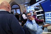 NEW YORK, NEW YORK - MAY 04: Traders work on the floor of the New York Stock Exchange during morning trading on May 04, 2026 in New York City. Stocks dropped at the opening as tensions remain over further escalation in Iran, after U.S. President Donald Trump said the U.S. will start escorting ships to exit the Strait of Hormuz in a plan dubbed “Project Freedom”. (Photo by Michael M. Santiago/Getty Images)