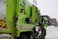 A Green For Life (GFL) waste truck drives down Queen street East in Sault Ste. Marie in February  2026. Deborah Baic/The Globe and Mail



