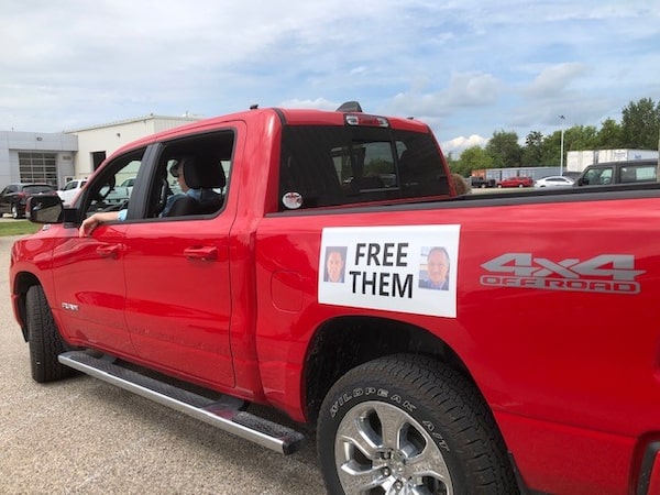 The magnetic signs on the Ram pickup that travels the roads of St. Marys and beyond is an extension of efforts to put pressure on for the release of Spavor and Kovrig.