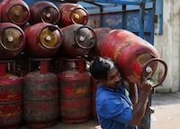 A man unloads an empty LPG cylinder at a warehouse amid supply disruptions following the U.S.-Israeli conflict with Iran, in Mumbai, India, March 11, 2026. REUTERS/Francis Mascarenhas