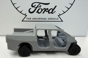 Ford gave journalists a small 3D-printed model of the shell of its next EV. It doesn't have much detail and is missing the front end – but it's definitely a truck.