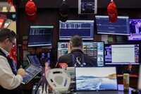 Traders work on the floor at the New York Stock Exchange (NYSE) in New York City, U.S., April 2, 2026. REUTERS/Jeenah Moon