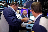 Traders work on the floor at the New York Stock Exchange (NYSE) in New York City, U.S., July 20, 2026.  REUTERS/Brendan McDermid