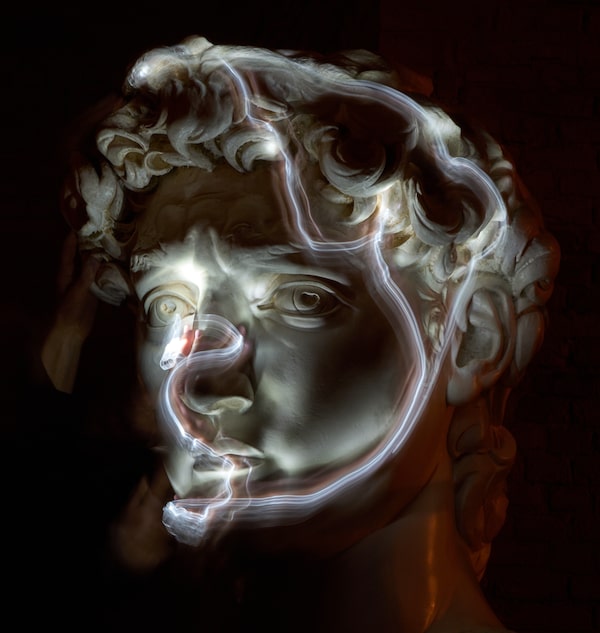 Stefania Terre, who is blind, wore a light on her finger as she explored a model of Michelangelo’s David for this long-exposure photo. The real David is in Florence, far from this tactile museum on the Adriatic coast.