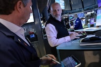 NEW YORK, NEW YORK - APRIL 13: Traders work on the floor of the New York Stock Exchange during morning trading on April 13, 2026 in New York City. Stocks opened up lower after U.S. President Donald Trump ordered a US blockade of the Strait of Hormuz following failed negotiations with Iran that sent oil prices back over $100 per barrel. (Photo by Michael M. Santiago/Getty Images)