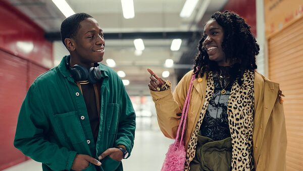 RYE LANE (2023). David Jonsson and Vivian Oparah in RYE LANE. Yas (Vivian Oparah) and Dom (David Jonsson), two twenty-somethings both reeling from bad break-ups, connect over the course of an eventful day in South London - helping each other deal with their nightmare exes, and potentially restoring their faith in romance. Photo by Chris Harris. Courtesy of Searchlight Pictures. © 2022 20th Century Studios All Rights Reserved.
