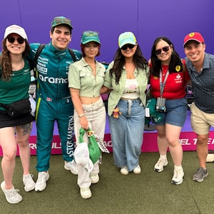 Jonah Presser, a Lance Stroll lookalike, poses with fans.