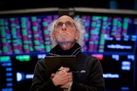 FILE PHOTO: A trader works on the floor at the New York Stock Exchange (NYSE) in New York City, U.S., April 7, 2025.  REUTERS/Brendan McDermid/File Photo