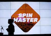 A person is silhouetted at the Spin Master toy and entertainment company in Toronto on Tuesday, January 29, 2019. THE CANADIAN PRESS/Nathan Denette