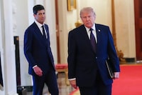 (FILES) US President Donald Trump is joined by the new Chair of the Federal Reserve Kevin Warsh (L) as they walk to the East Room of the White House during a swearing in ceremony for Warsh, in Washington, DC on May 22, 2026. The US Federal Reserve goes into a key rate-setting meeting this week, with the Federal Open Market Committee (FOMC) meeting scheduled for September 1516, 2026. Markets are expecting policymakers to pull the trigger on a rate hike to tackle persistently high inflation -- and analysts say central bank chief Kevin Warsh's credibility is on the line. The world's largest economy has been dealing with years of higher-than-target inflation, and prices have surged in the wake of US President Donald Trump's war on Iran, his signature tariff policies and the ongoing AI boom. (Photo by Aaron Schwartz / AFP via Getty Images)