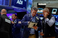 Traders work on the floor of the New York Stock Exchange (NYSE) in New York City, U.S., August 4, 2026. REUTERS/Jeenah Moon