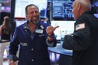 Traders work on the floor of the New York Stock Exchange (NYSE) in New York City, U.S., August 7, 2026. REUTERS/Jeenah Moon