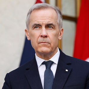 CANBERRA, AUSTRALIA - MARCH 05: Canadian Prime Minister Mark Carney takes questions during a press conference with Australian Prime Minister Anthony Albanese at Parliament House on March 05, 2026 in Canberra, Australia. Carney is in Australia to discuss trade and other matters. (Photo by Hilary Wardhaugh/Getty Images)
