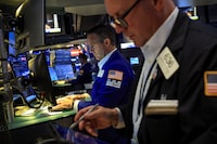 Traders work on the floor at the New York Stock Exchange (NYSE) in New York City, U.S., June 22, 2026.  REUTERS/Brendan McDermid